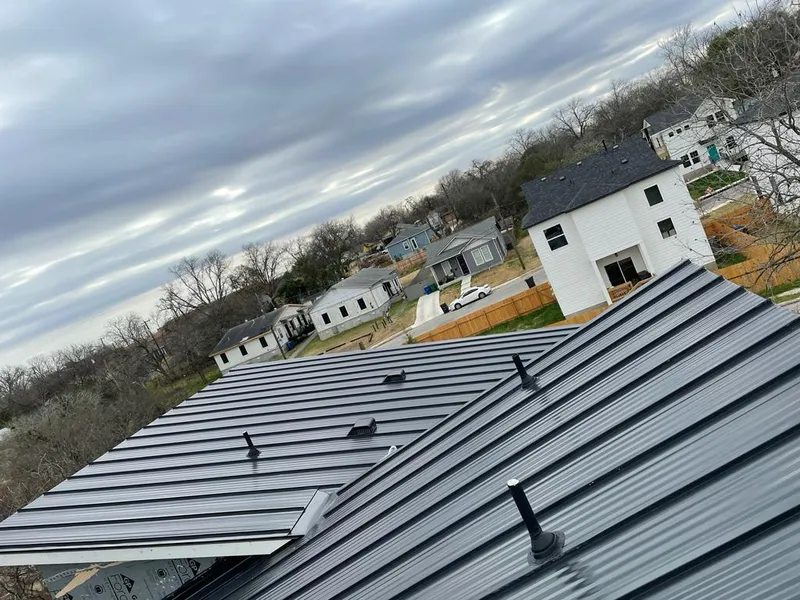 Standing seam metal roof panels with vents for Skylight Repair in Garfield Heights